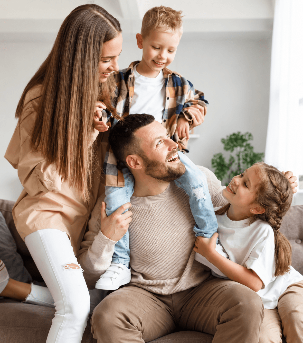 A family relaxing together at home after Wildwoods pest control service
