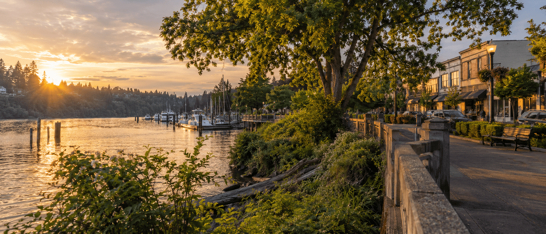 Milwaukie waterfront on the Willamette with the marina and historic downtown at sunset.